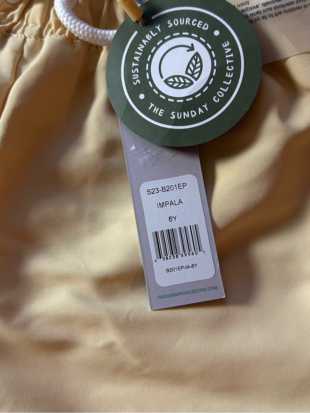Kid’s Drawstring Swim Shorts in Pale Yellow - Picture 2 of 10